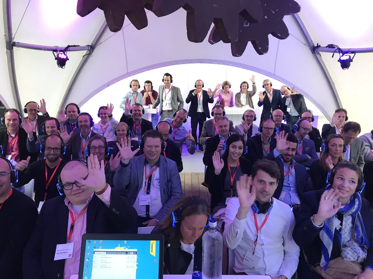 Yafsec's tweet photo. A “silent disco” talk. Everyone is wearing headphones! That’s a first! @zerocopter #financialsystems #FSB2018 https://t.co/xDLZzqdskr