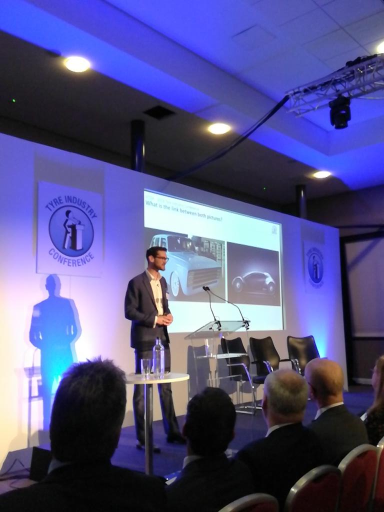 Tyrepress's tweet photo. Quentin Le Hetet, GiPA UK, talks global megatrends and current pace of development. Eg companies as diverse as Dyson and Kalashnikov developing electric vehicles. #TIC2018 https://t.co/KMhsZbLAy2