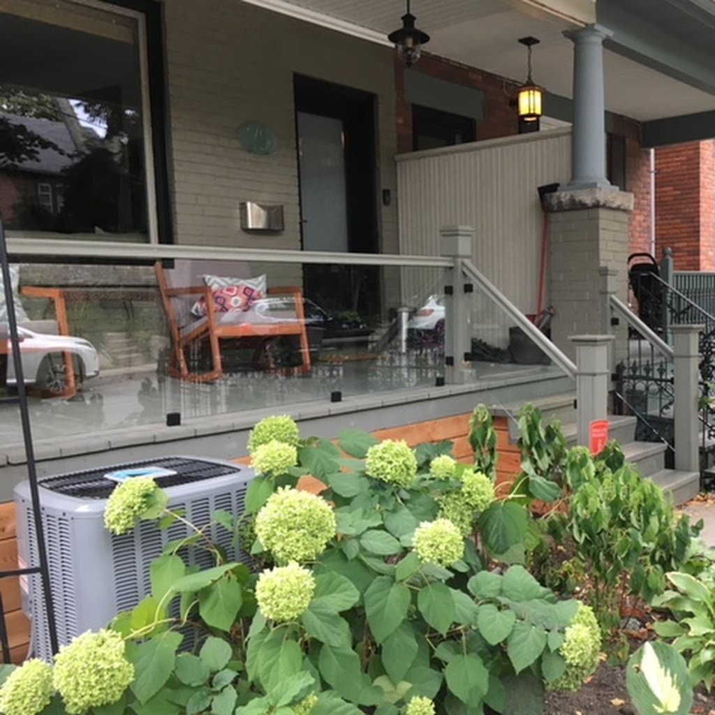 DoorsandMore's tweet image. A gorgeous Glass in Wood exterior railing is one of our most recent railing installs. The wood railing keeps the aesthetic in line with the look of the house and the glass allows for easy viewing from the porch. Time to grab a drink and watch the world go by! #customrailing #view