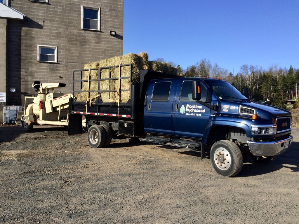 Mar_Hydroseed's tweet photo. One of our @FinnCorporation Straw Blowers and truck loaded with bales for an #erosion control job. We are heading to a clients project to cover and protect the bare sub-grade before it rains. #BMP #bestmanagementpractice https://t.co/IejAio5YUC