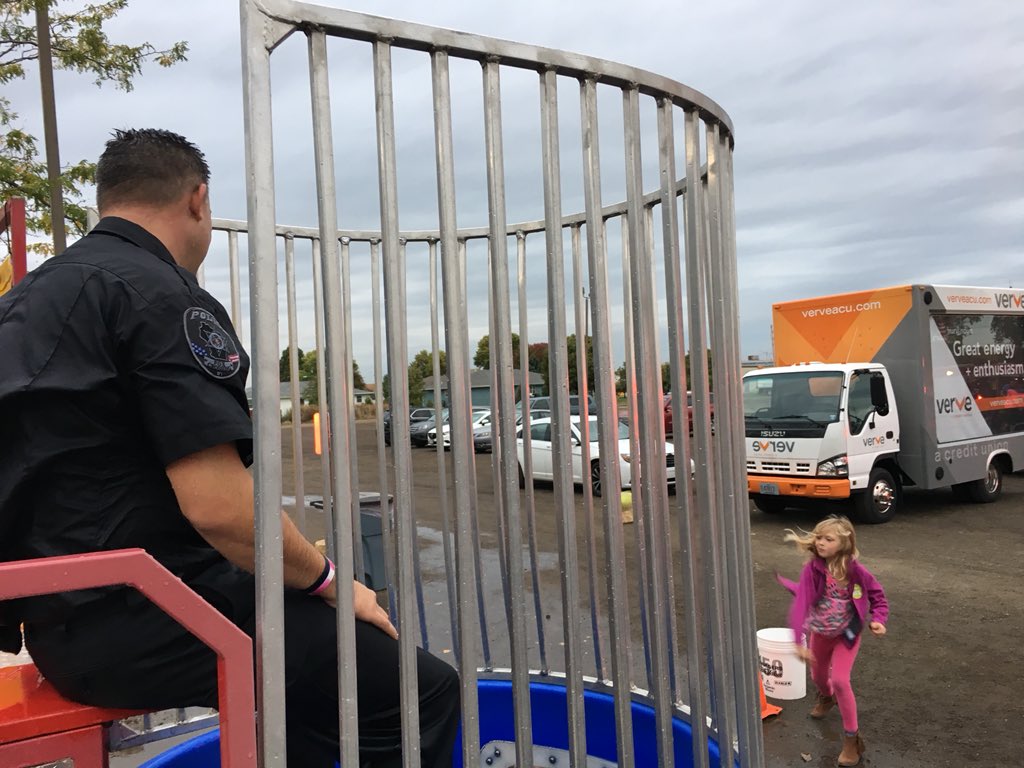 AppletonPD_WI's tweet photo. A couple more shots of the fun at last night’s “Heat, Fire and Ice”. Props to Chief Olson of @NeenahPolice and Officer Wiechman of @FoxCrossingPD for taking a bath in the dunk tank! https://t.co/CUpsuQ8oCF