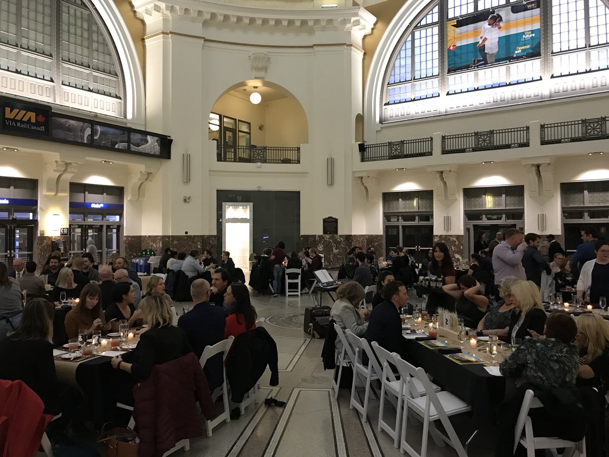 eatnorth's tweet photo. Everyone is settling in with their welcome cocktails made with @EauClaireCraft Saskatoon berry gin and rhubarb & lavender @PortersTonic, both special #PrairieGrid2018 limited release. #proudtobeprairie https://t.co/DKikK98JYW