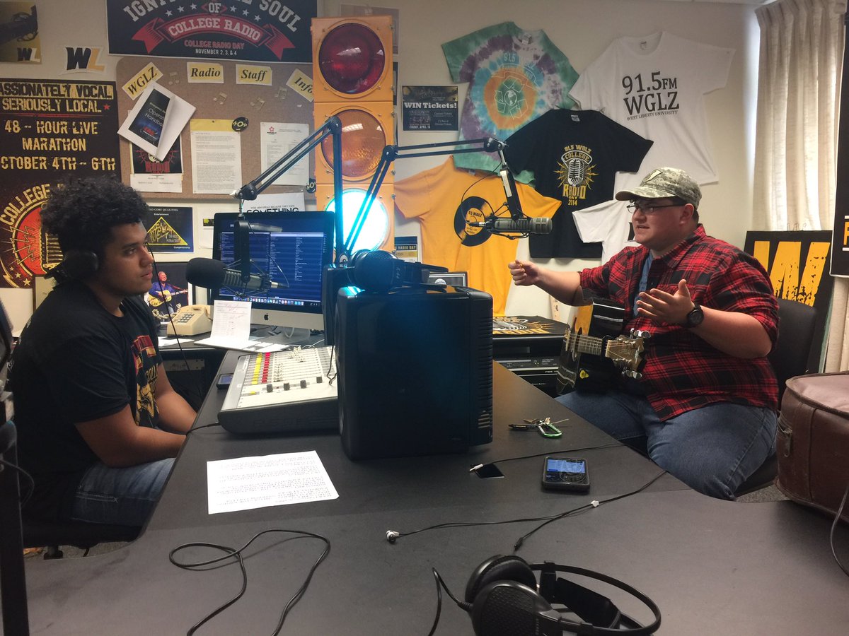 915WGLZ's tweet photo. Some early highlights from our College Radio Day programming, including students Joe Beers, our 24 hour anchor Isaiah Martin, and “Guitar Guy” Sean McCarty. #wglz #collegeradioday @collegeradioday https://t.co/pmVn1MBHVh