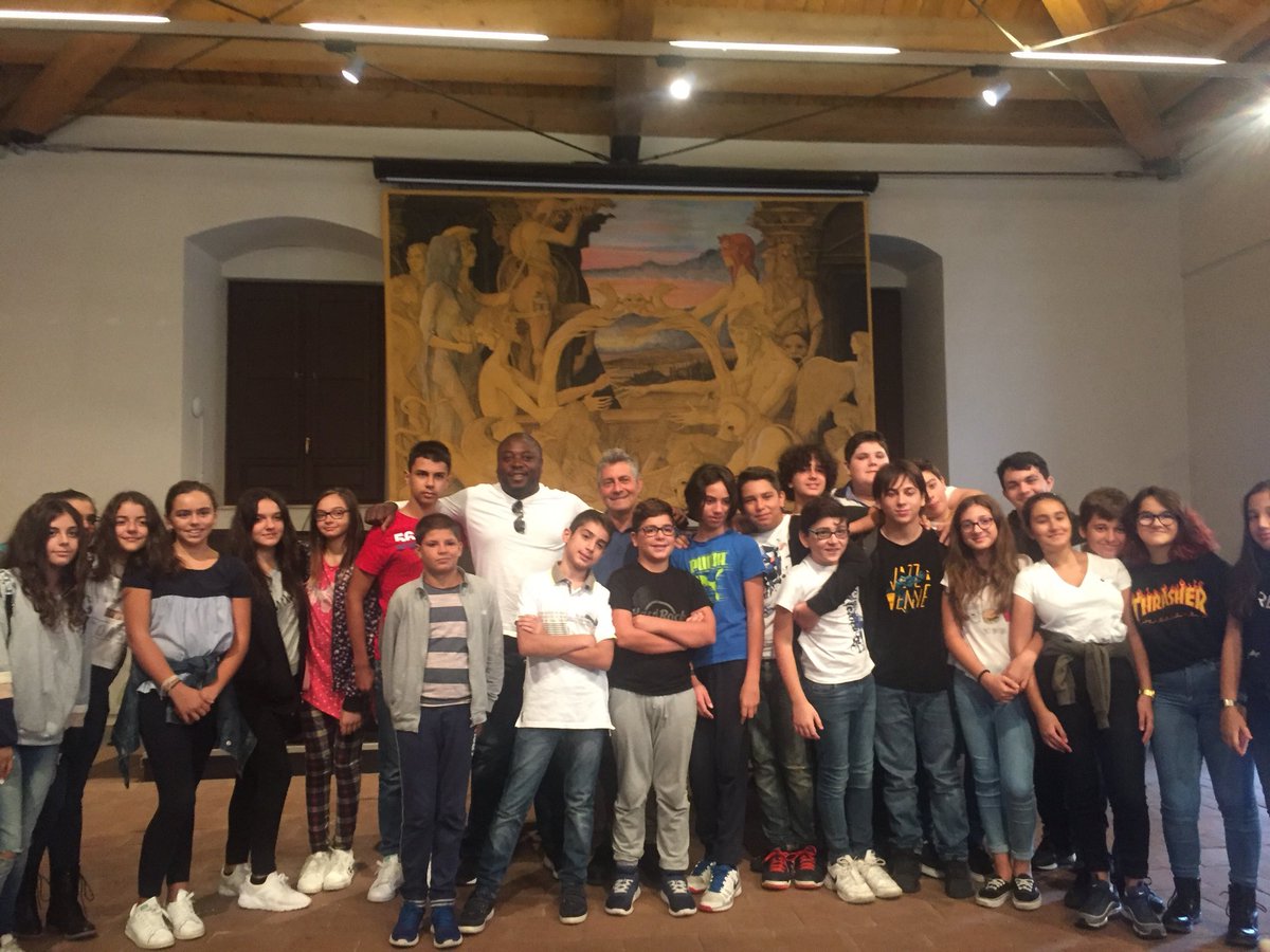 Eric Ngalle Charles aka <a href="/yomadene/">Eric ngalle charles</a> meets teenagers in #Catania during his residency with our partner <a href="/SabirFest/">SabirFest</a> <a href="/WAICymruWales/">WAI Cymru Wales</a> <a href="/PENWalesCymru/">Wales PEN Cymru</a> <a href="/Arts_Wales_/">Cyngor Celfyddydau Cymru | Arts Council of Wales</a> <a href="/BCouncil_Wales/">British Council Wales</a>
