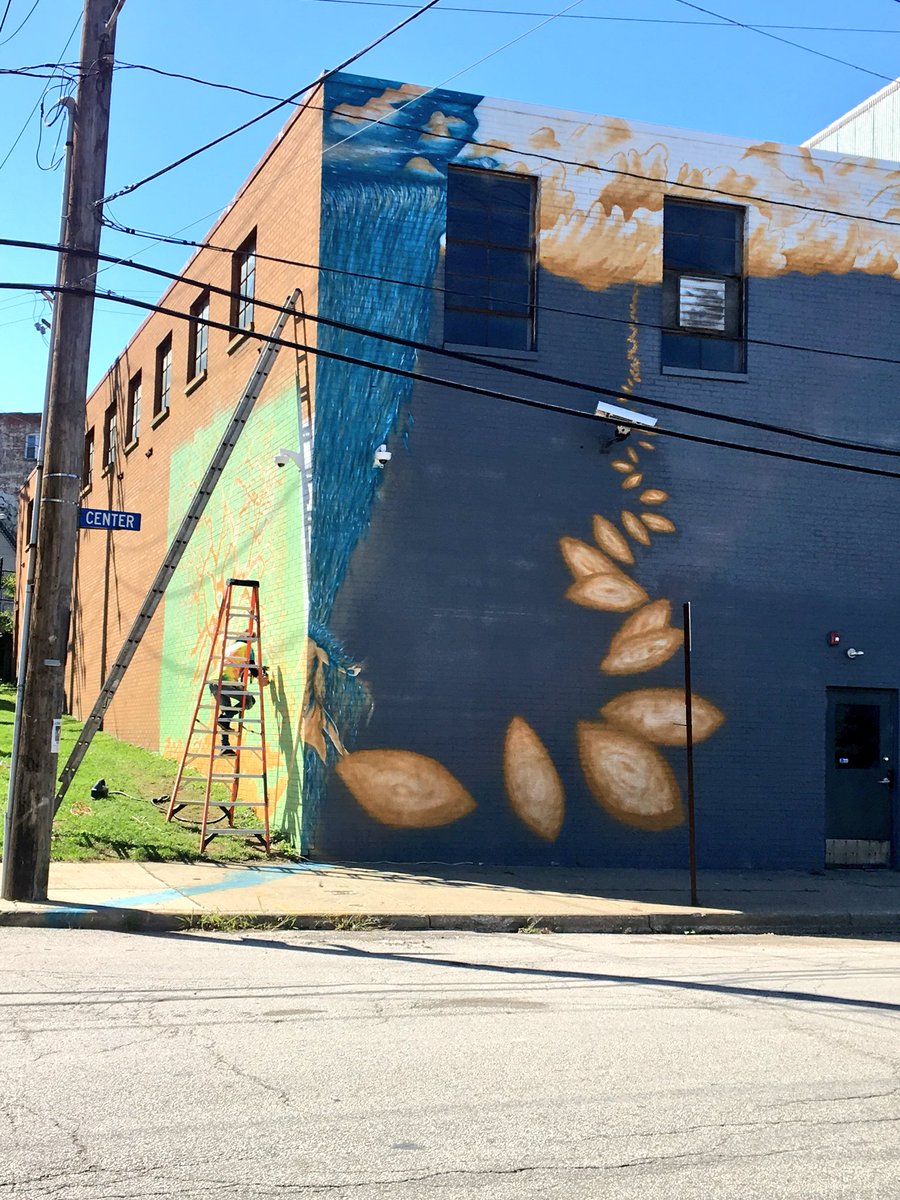 FlatsForward's tweet photo. New mural in #theFlats! Courtesy of artist Jordan Serpentini and @TenkWestBank 💚💙 https://t.co/713qFcWKvy