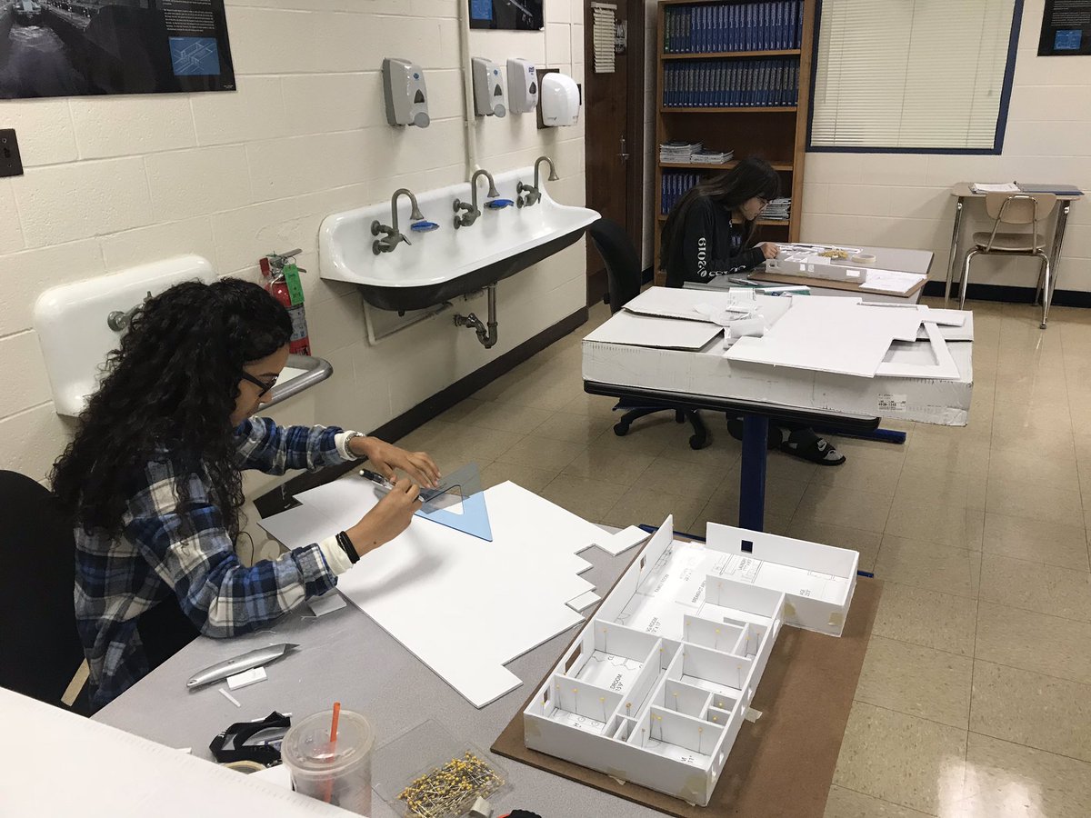 Mr_West_JTHS's tweet photo. These two young ladies are showing off their skills in my advanced drafting class. Plans were developed in @AutodeskRevit and now they are creating #scaled models. #SpatialRecognition #FutureArchitect #GirlsInSTEM #STEM @JTHS_204 https://t.co/ZKXODfdVqo