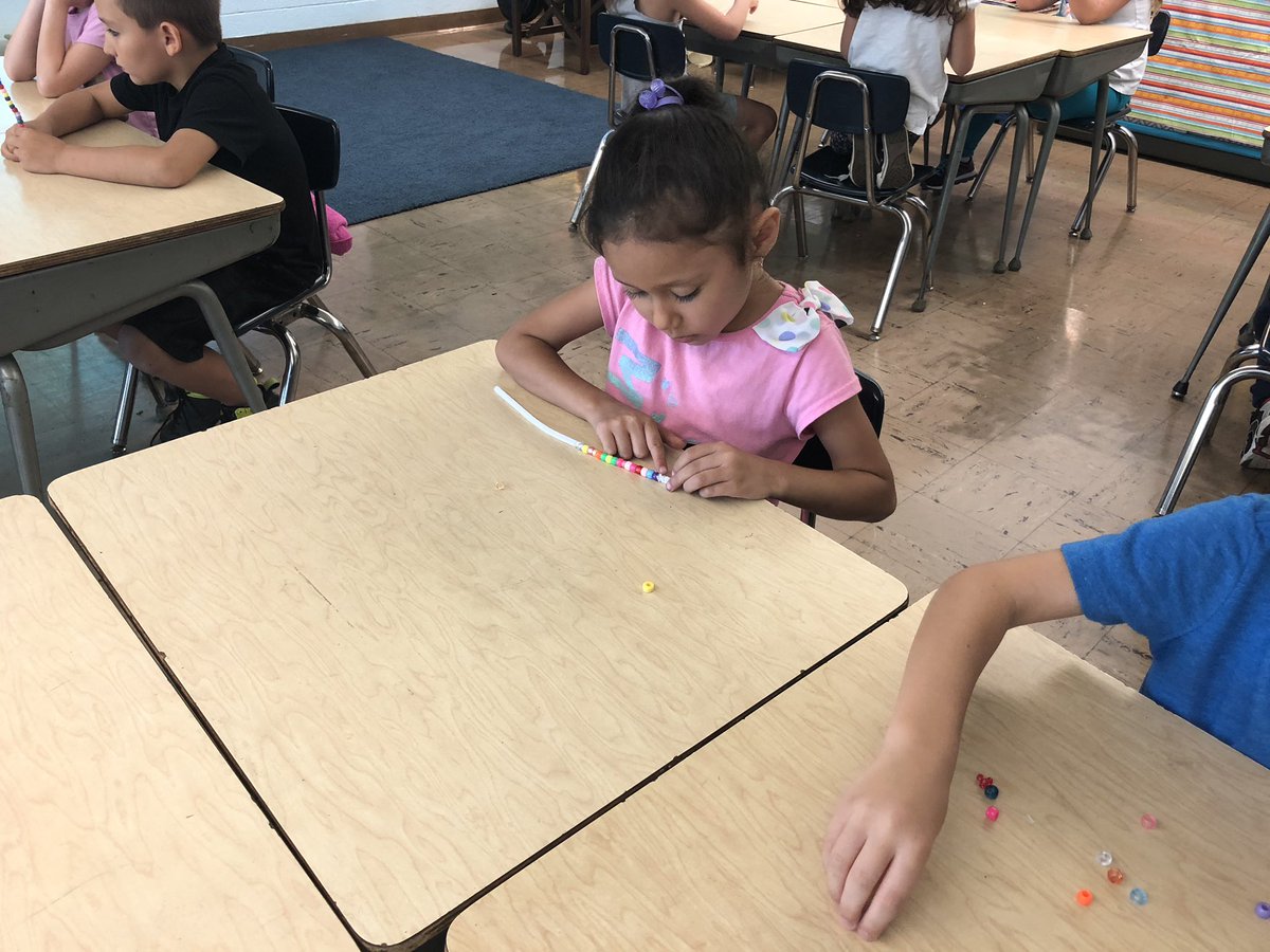 Making our own personal Abacus to use as we practice addition strategies! 🤓