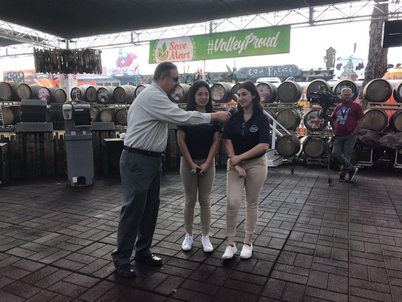 DA Seniors at the Big Fresno Fair educating the public on personal hygiene with a Germ Glow demonstration
