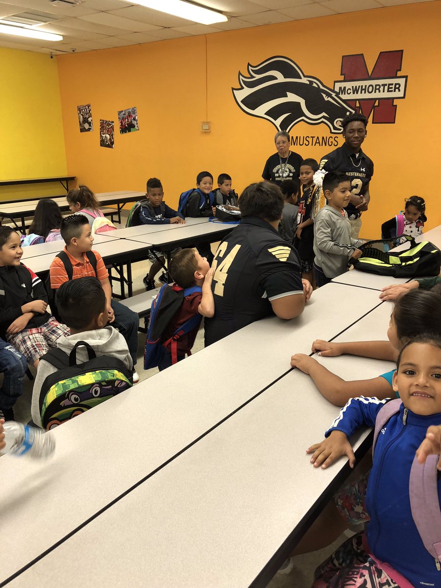 Game day!!   Westerner football players opening doors at McWhorter