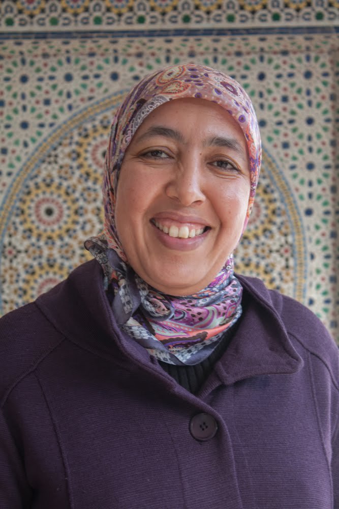 peacecorpsma's tweet photo. Our regional managers make sure that volunteers are placed in warm, welcoming communities. RM Fatima says that one word she would use to describe her @PeaceCorps journey is: THRIVING. #55YearsofFriendship #PCinoneword https://t.co/givLhn8SKY