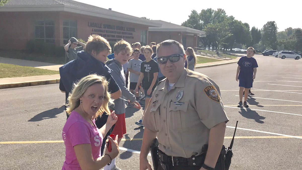 Love seeing Officer Diener working with Mrs. Harashe’s science class as they learn to calculate speed. #LaSallePRIDE