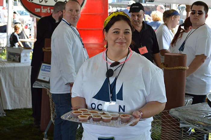 OceanEdu's tweet image. OCC hospitality program student, Rosie Melchiorri, serving samples of the Ocean County College team’s red chowder at this year’s Chowderfest with a record-breaking 13,000 people in attendance! For more Information: ow.ly/CAF930m7ilt #MyOcean #Chowderfest