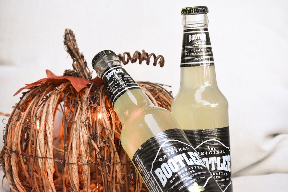 DrinkBootleg's tweet photo. Pumpkins. Candles. Fuzzy socks. Bootleg. 🍂🍃Prep your get togethers, football watch parties, and late nights by the fire with the refreshing taste of Bootleg. #DrinkBootleg https://t.co/Nbz0vHNZnM