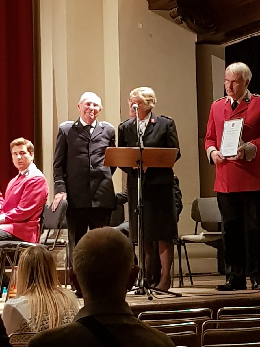 Bm Don Jenkins receiving a Certificate of Exceptional service in recognition of his contribution to SA music making from the SA Music Ministries unit at our Pre Contest Festival by Major Allison Gaudion.