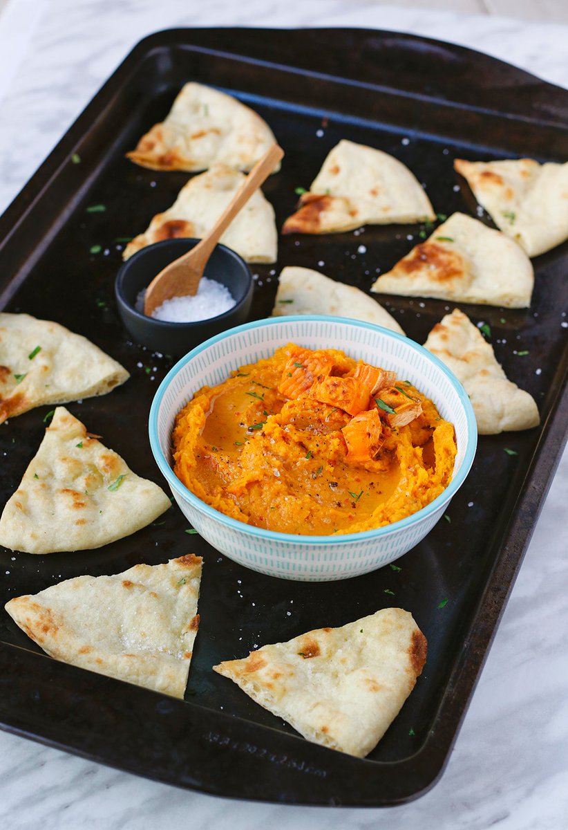 Roasted Butternut Squash Hummus makes a delicious #Thanksgiving appetizer. Serve with fresh baked pita for your guests to snack on.
