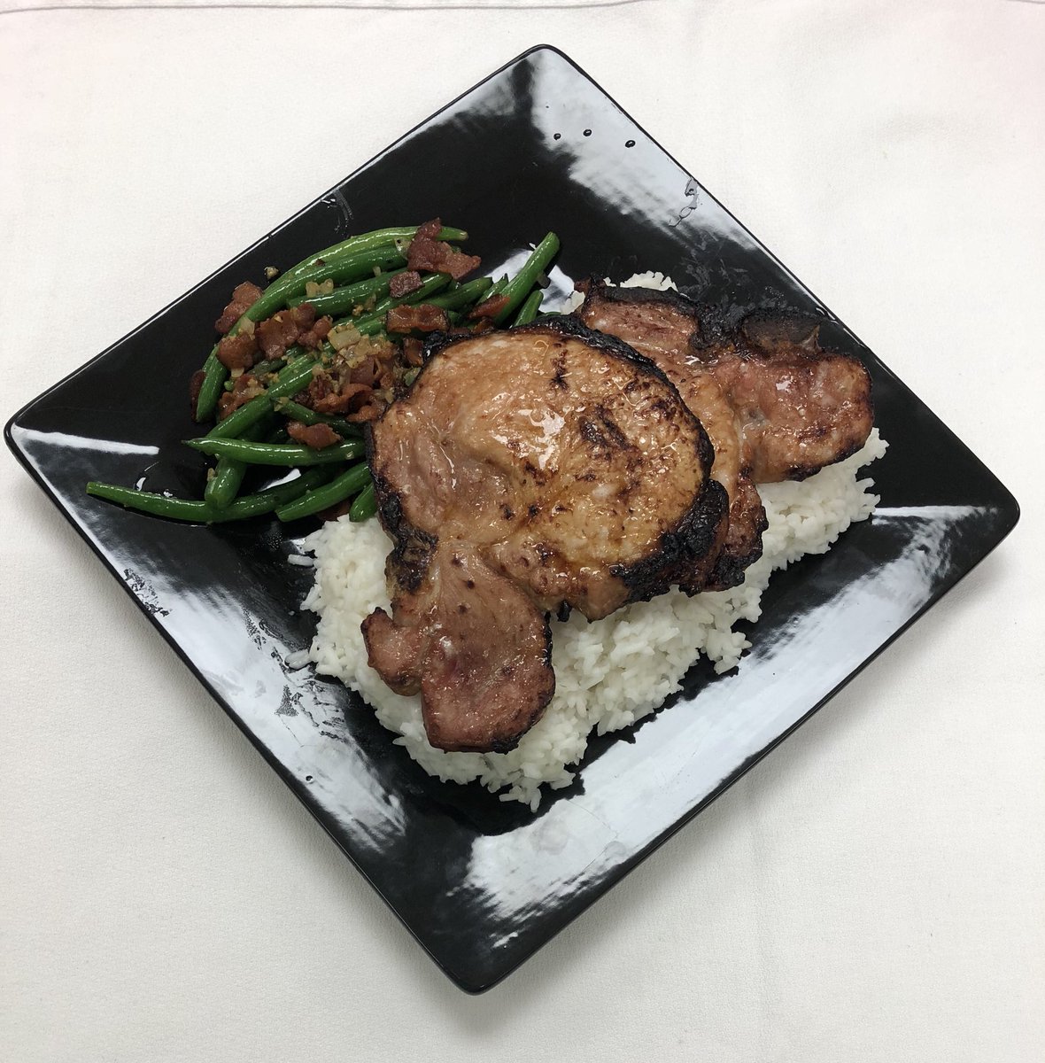 dhsculinaryarts's tweet image. It was a hot but fun day broiling pork chops! We added some sautéed green beans and a bed of rice.  #dhsculinaryarts #broiling #blanchandshock