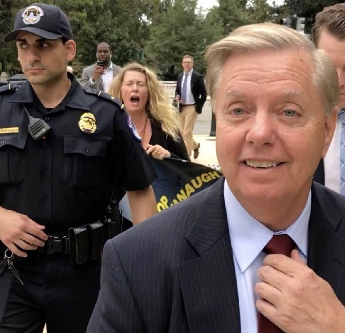 LauraLoomer's tweet photo. This might just be one of the best pictures to come out of 2018. 

Psycho liberal screaming at a based Republican, and a nice police officer who has the unfortunate duty of having to deal with unhinged Lefty protesters. 

Sums up the 2018 political cycle  pretty well. https://t.co/VkHTAwmZ2l