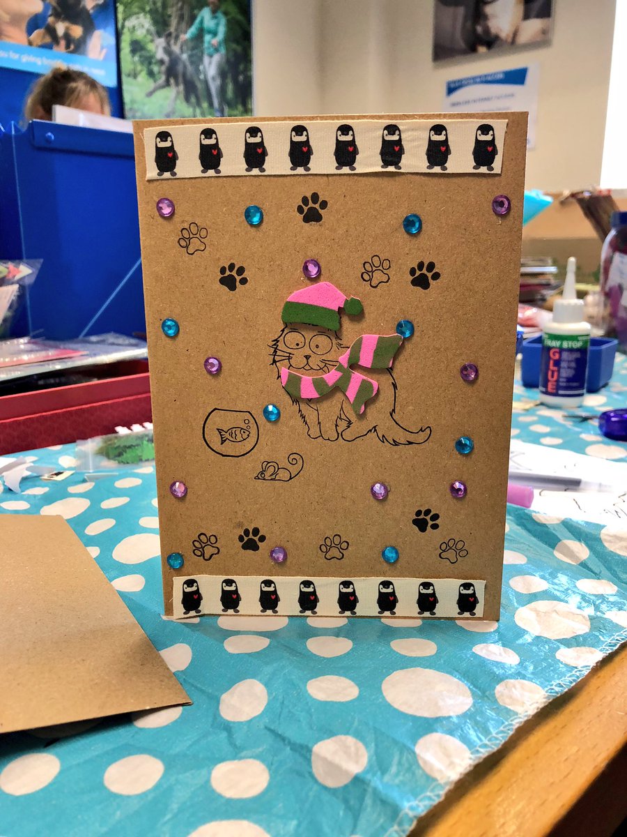 EmmaJonesGB's tweet photo. We went all Art Attack in the office today... Β£1 to get to play with Marias craft stash was well worth it to support #BlueCrossWeek ... check out my penguin/cat card masterpiece! Tony H eat your heart out π»π§ππΌ https://t.co/v3AzmAOkLs