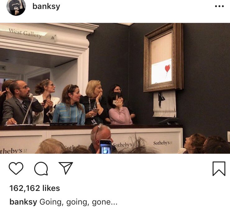 jackiefox_'s tweet photo. Banksy spray painting of ‘Girl With Balloon’ shreds itself after being sold for over £1m at @Sothebys 🤭 https://t.co/R4EiJHRQC6