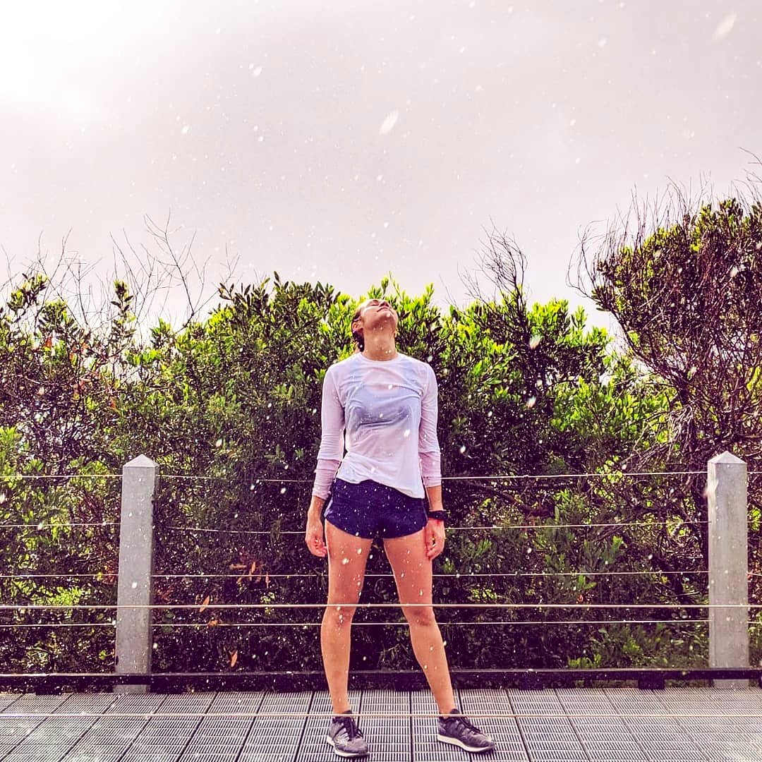 wod_up's tweet photo. WODUP Ambassador @luamarchi takes a moment on her 1:30hr coastal run. "In contact with nature, feeling the rain, wind and sunshine touching my skin. THE best way to start a really busy day ahead, because life doesn't wait for the rain to stop". 
#wodup #makeyourimpact #ecoisgo https://t.co/hzP9nfPfUE