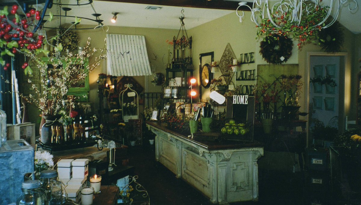 joannagaines's tweet image. 15 years ago... Happy Anniversary Magnolia! 
A few things I want to call out from these photos: 
Red lipstick. 
The vase on the counter- I remember I stenciled the words "imagine" and "dream" on these vases I had bought for a buck each at a garage sale.