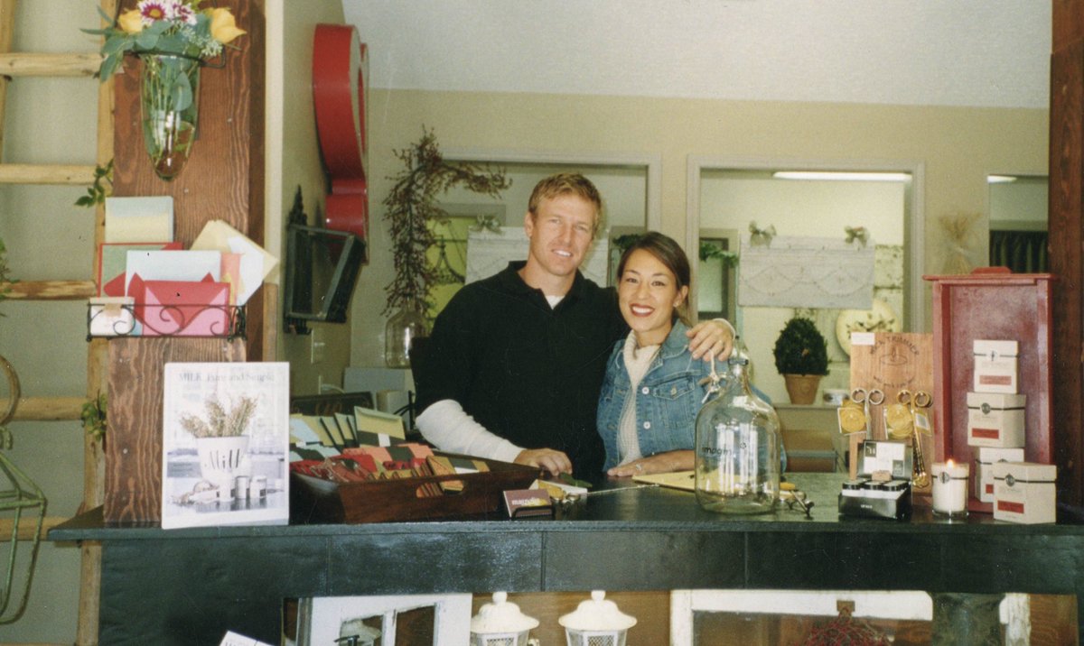 joannagaines's tweet image. 15 years ago... Happy Anniversary Magnolia! 
A few things I want to call out from these photos: 
Red lipstick. 
The vase on the counter- I remember I stenciled the words "imagine" and "dream" on these vases I had bought for a buck each at a garage sale.