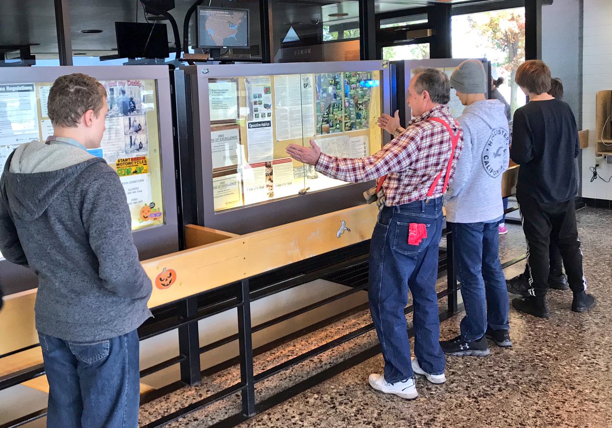 GKHSband's tweet photo. Here we see Papa John and some band students learning about the indigenous plants of the area.  Who says you can’t learn at a rest stop #gkcogs #crosscurricular #KnowledgeIsPower #pottybreak https://t.co/GYO6v52npM