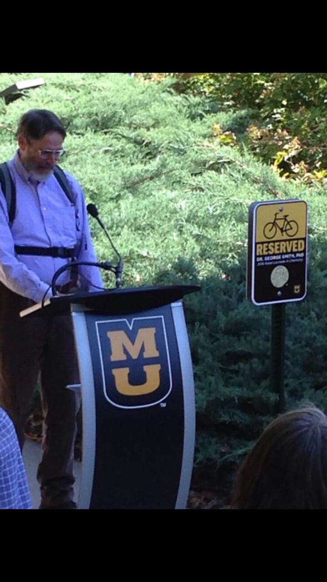 Nobel laureate George Smith getting his own parking spot - for his preferred mode of transportation.