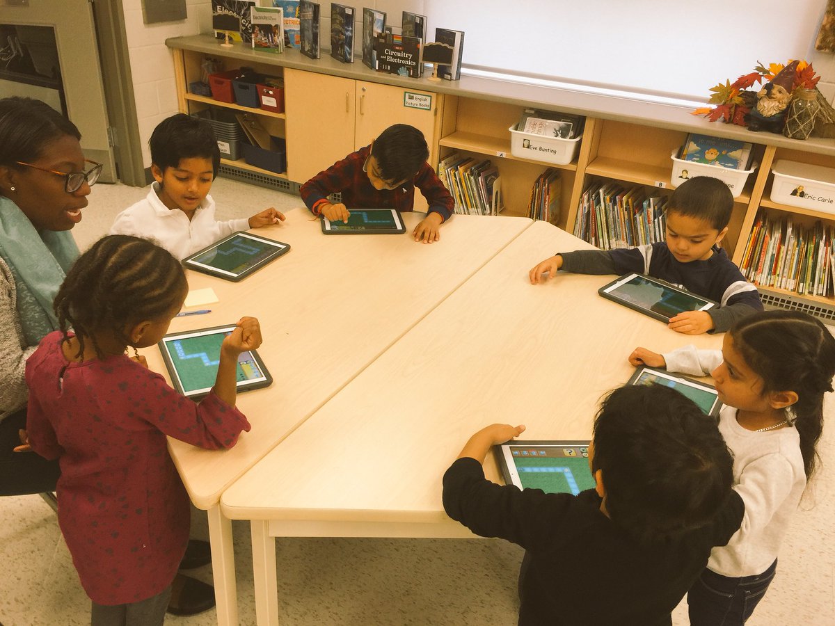 MsClareMcKinney's tweet photo. Today the kindergarten students were “Falling” in love with coding! Students used @littlecodr action cards to lay out a sequence of steps to get the leaf from point A to B! Students coded around the acorns and nuts left by the squirrel! While others used @kodable @FairlawnPSPDSB https://t.co/wdIBqq1ipF