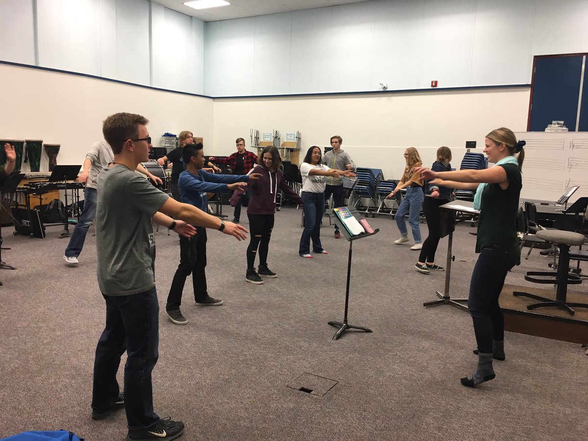 cchschool's tweet image. Miss Nordlee leading physical warm up with the Concert Band!  Collaboration between phys. ed and music. Also team building playing Rock/Pebble Jacks #interdisciplinarywork #firstnationsgames #hs4  #abed #mfwhsr