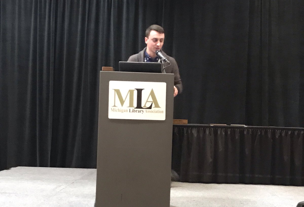 LibraryofMich's tweet photo. Congratulations to Dillon Geshel, Director of the Portage Lake District Library, winner of the #mla18ac Up & Comer Award! https://t.co/cpwq4Sx15w