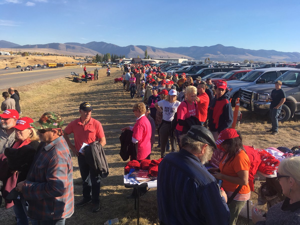 TimGoessman's tweet image. Current line for the bus to the rally. Event parking is full, cars parking along W Broadway #trumpmt #mtpol