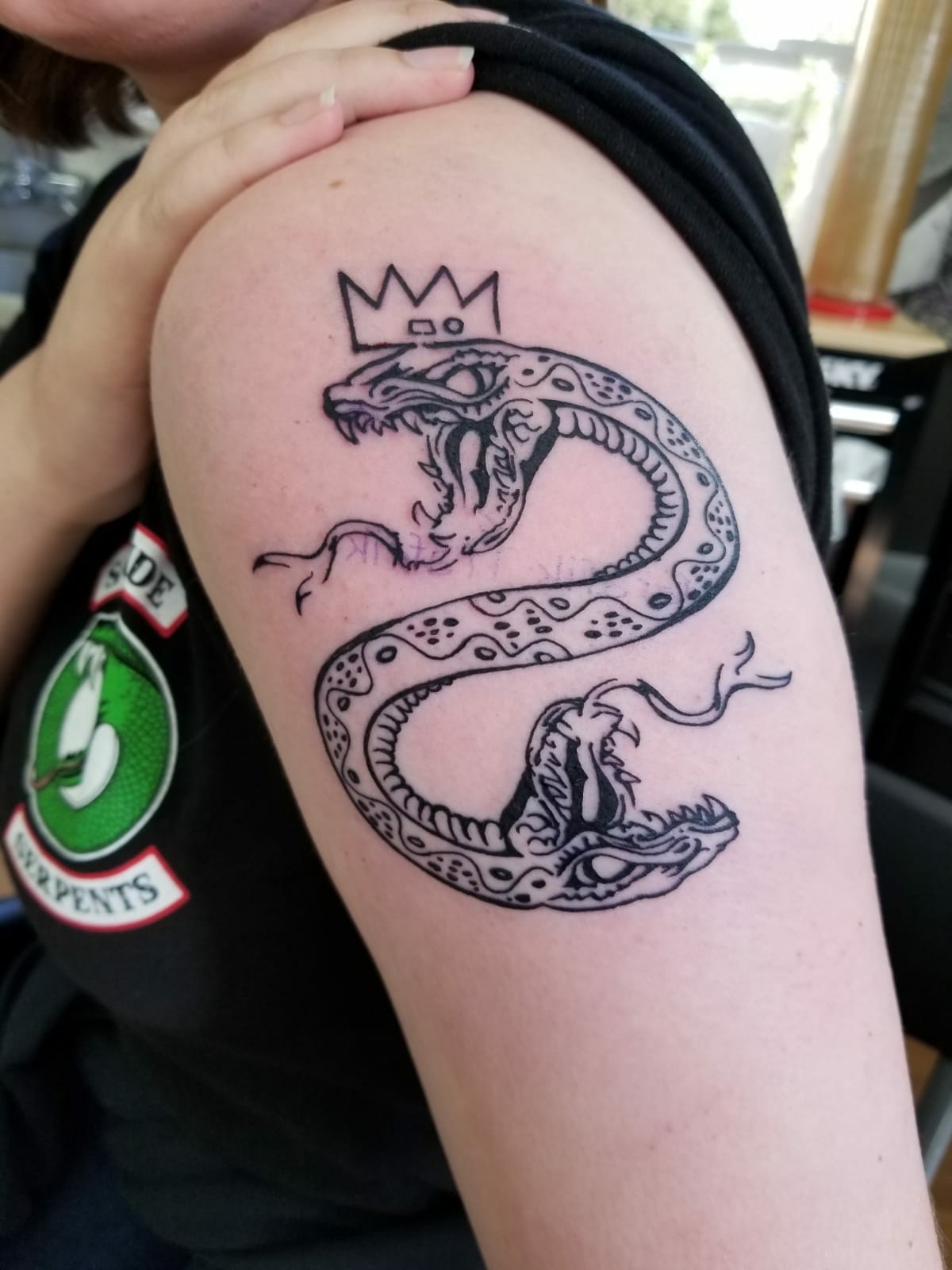 Snake tattoo on the hip