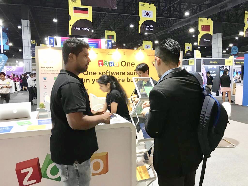 Zoho's tweet image. It’s day 2 at CeBIT Asean Thailand 2018, Bangkok. Do drop by booth I16 and learn how to run your entire business on Zoho. #cebit #zoho