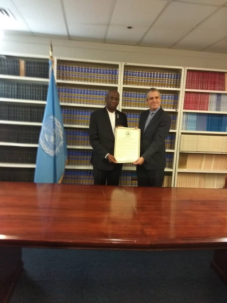 FRSCNigeria's tweet image. Corps Marshal @FRSCNigeria along with Amb. Bolaji Akinremi, presenting the instrument of accenssion on @UN Convention on Road Traffic personally signed by Mr. President @MBuhari  to Mr Santiago Villalpando, United Nations Chief Treaty Section Office of Legal Affairs.