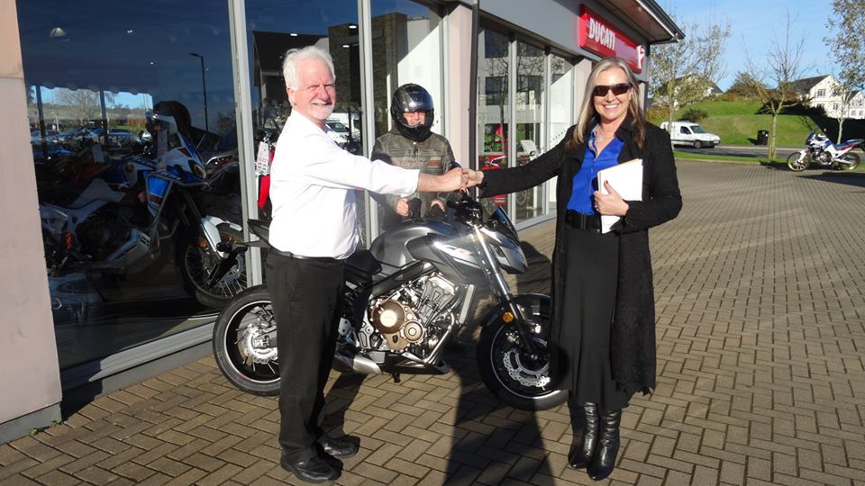Here we see Helen Gough receiving her custom CB650F from Sales Executive Noel Humphreys. In the background is Alan the lucky man who gets to ride the bike home for Helen. #Happyhandover