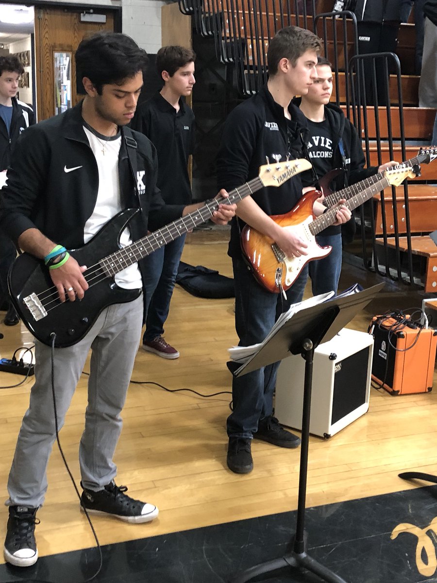 Pep rally under way at Xavier ... the band plays on ... the undefeated soccer team fires up the crowd.  ... all the fall sports represented ... a fabulous high school tradition. #ThisIsXavier