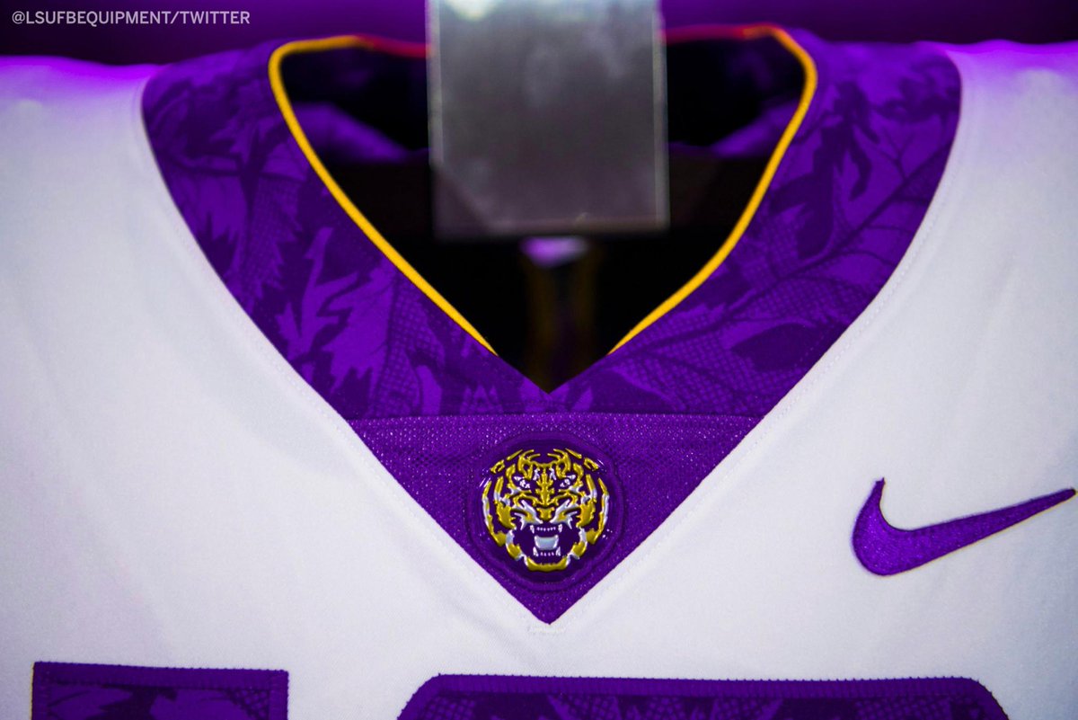 ESPNCFB's tweet photo. The @LSUfootball team's special uniforms for this weekend to commemorate the 1918 season that was cancelled due to World War I are incredible. (via @LSUFBEquipment) https://t.co/YAkp54u916