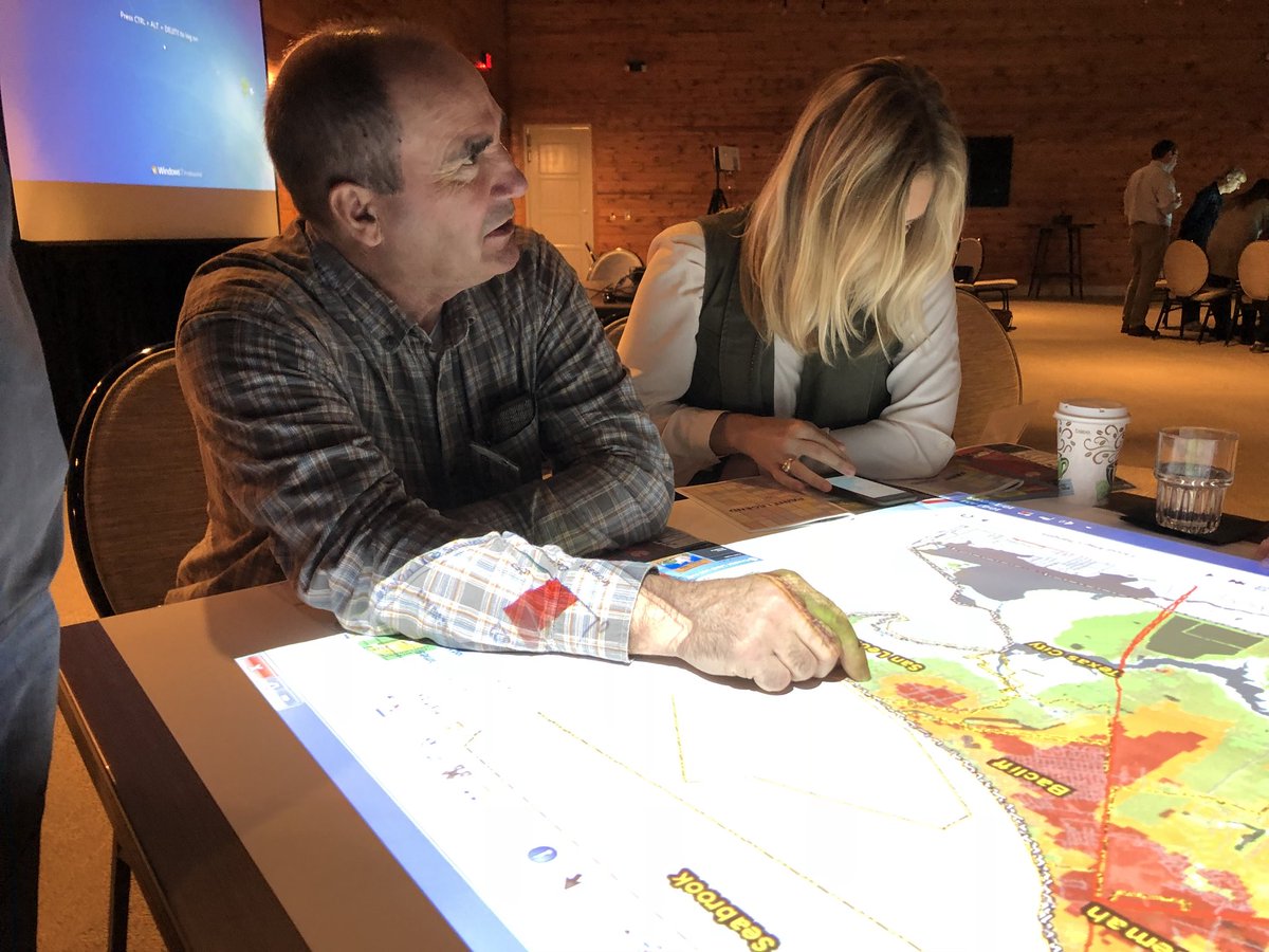 ExtDisasterEd's tweet photo. #EDENam18 delegates are familiarizing themselves with the many layers in @CharmCommunity’s maps and starting great conversations on potential hazards. https://t.co/FX6WS7ZR0z