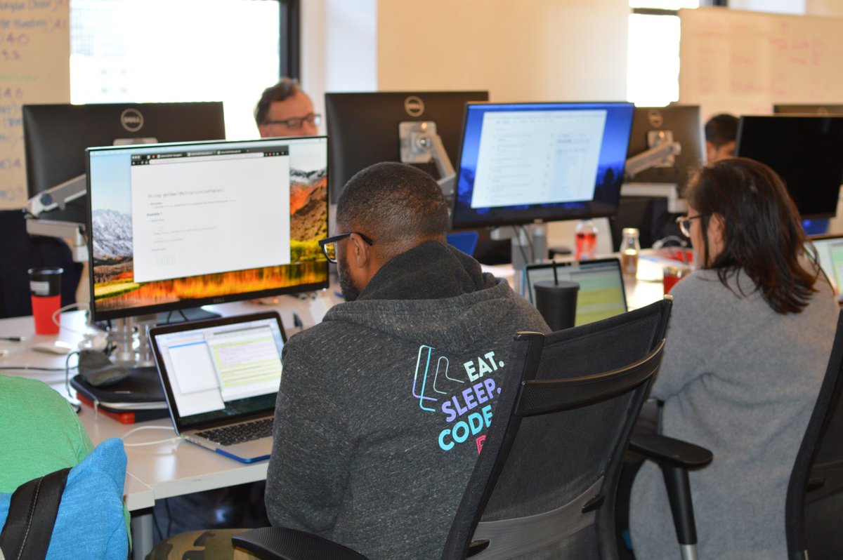 zipcodewilm's tweet photo. Our newest cohort has made it through week one! For one student in particular, the full immersion into Java is what keeps him going. Curtis is ready to go all in, even wearing his hoodie with the constant reminder to eat, sleep, code, repeat. #startwithzipcode #FridayFeeling https://t.co/rWthgCLVEA