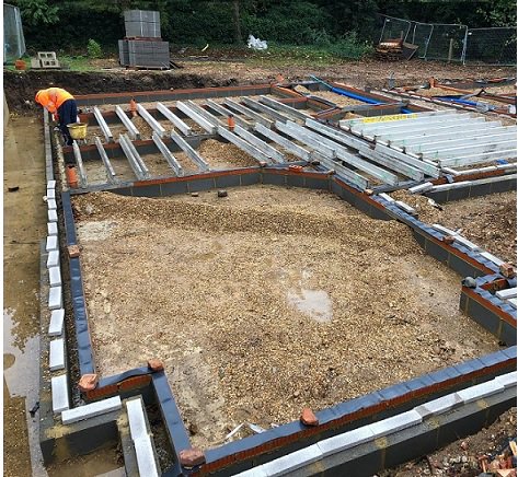 CharconCS's tweet photo. @CharconCS site team laying out beams for #beamandblock installation https://t.co/u1CRhcksej