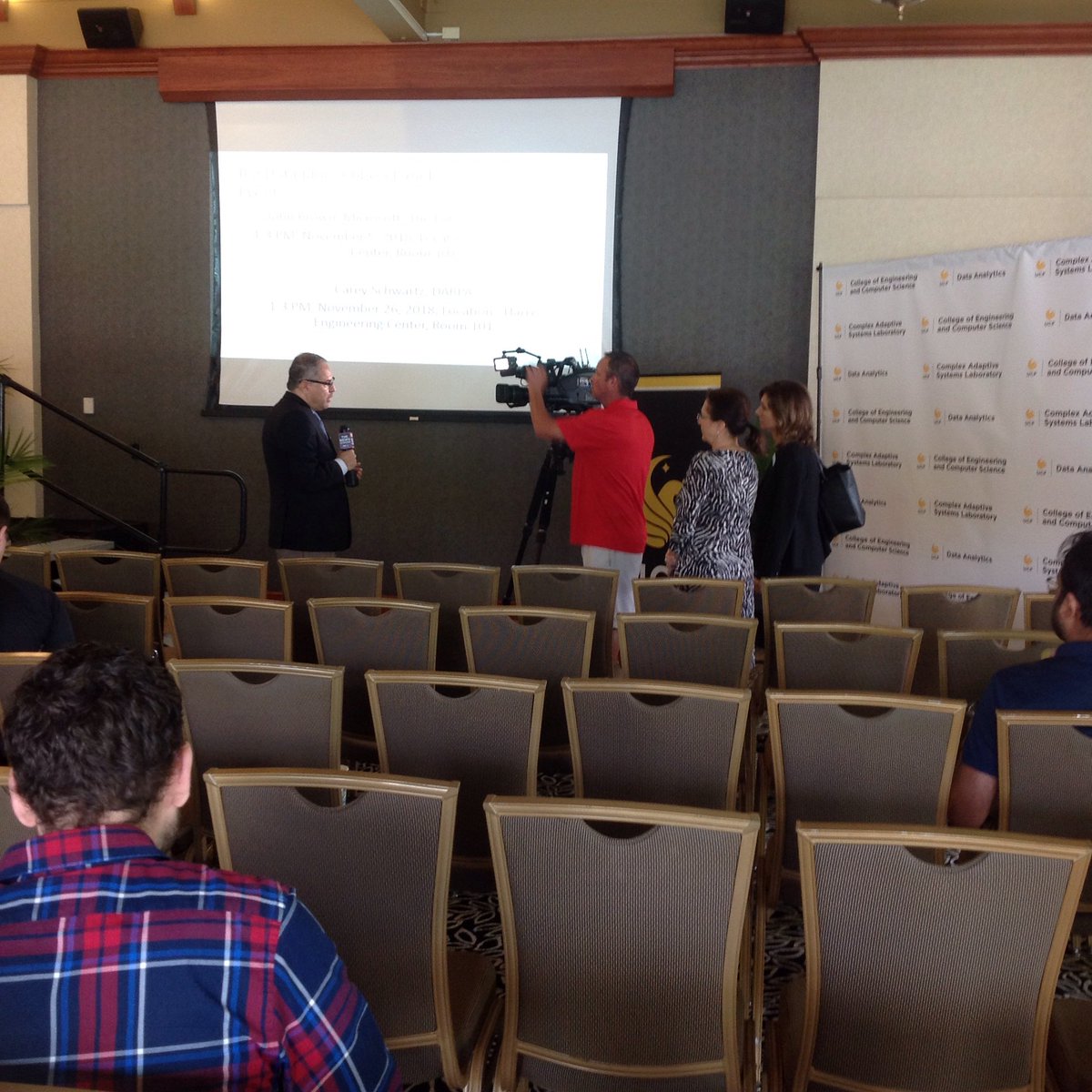 UCFCECS's tweet image. Civil engineering chair Mohamed Abdul-Aty talks to the media at the Data Science Summit. #UCFDataSci