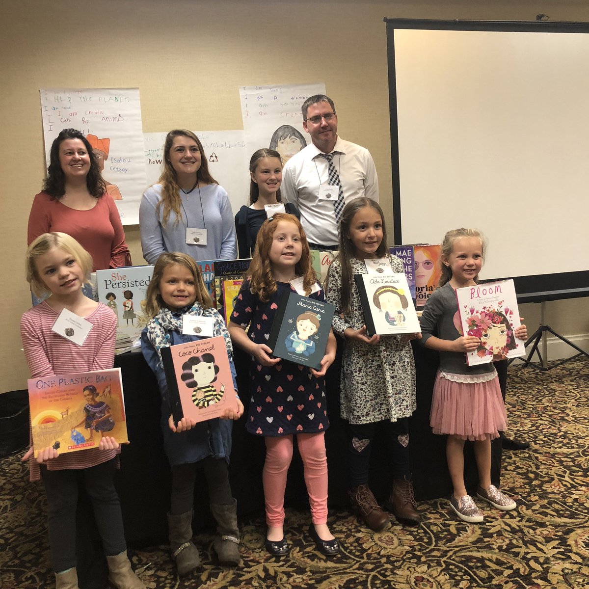 raelynne_snyder's tweet photo. A text rich environment leads to inquiry with these #LittleLearners working w/ staff and students from @clarionu - access to diverse text matters - young women are learning about women who are changing the world - and are making connections to themselves. #PCSS2018 @NCSSNetwork https://t.co/1ldmQDrGvD