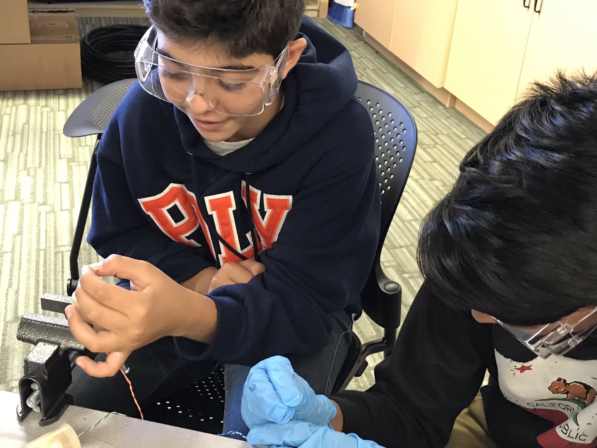 johnyen's tweet image. Assembling motors and putting the final touches on the ROVs. Launching in the pool next week. #polysolves