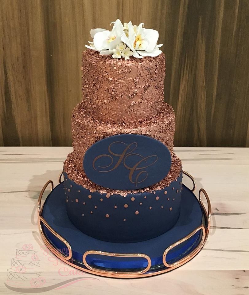 fancythatcakeca's tweet photo. Gorgeous copper and navy wedding cake from the other day at the Elora Mill! #FancyThatCake #WeddingCake https://t.co/hmGfyIq7mZ