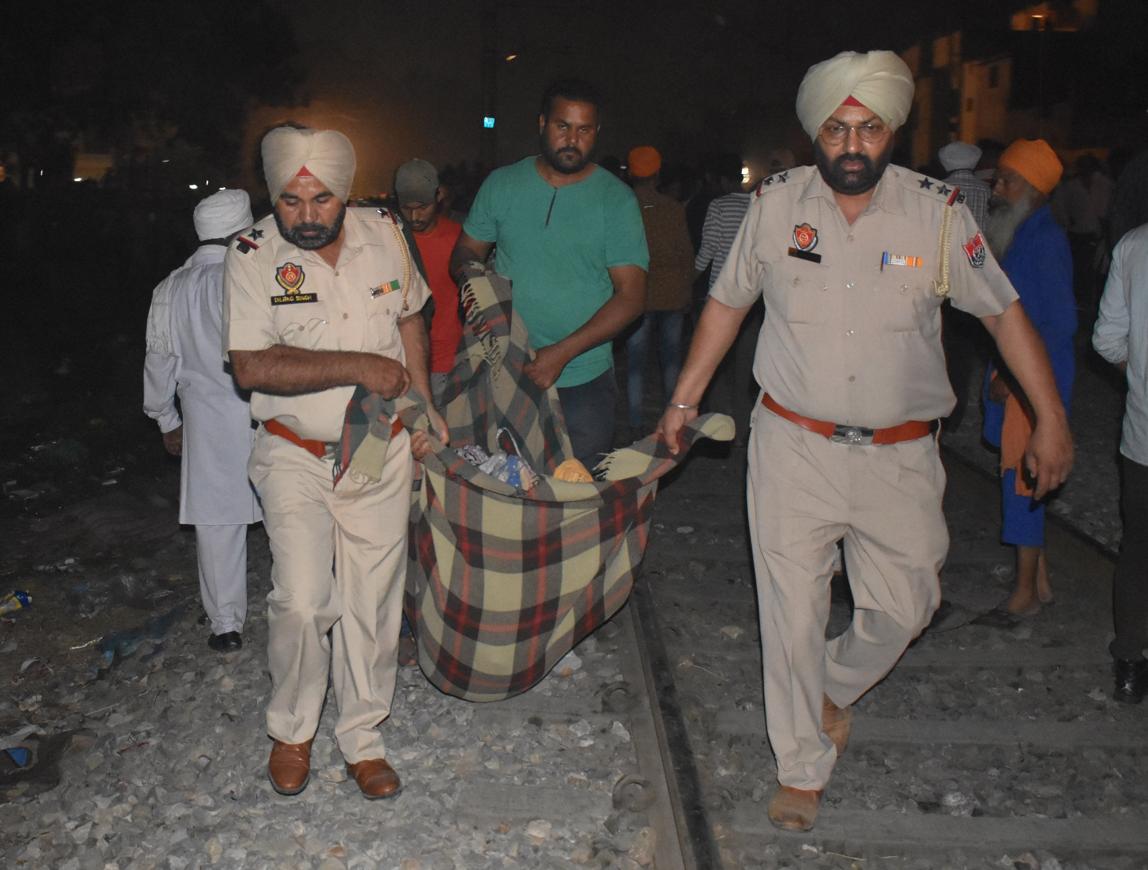 htTweets's tweet photo. #AmritsarTrainAccident | Nearly 55 were killed as a train mowed down people watching a Ravana effigy burn in Amritsar’s Joda. 

Track updates here: https://t.co/pqgT1UMazZ https://t.co/u81mvVia4I