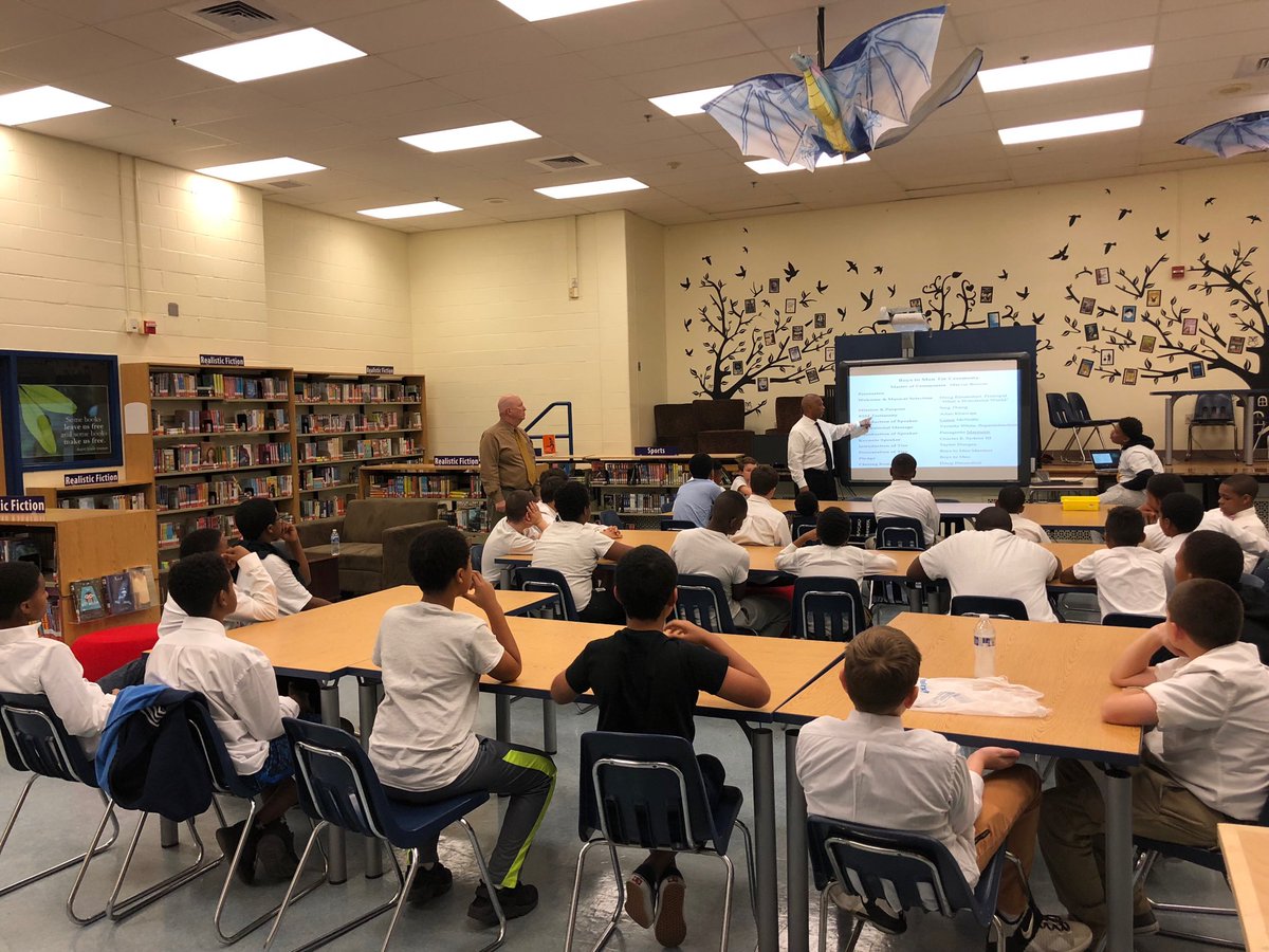 Boys to Men discussing their pledge for  Catonsville Middle and home.