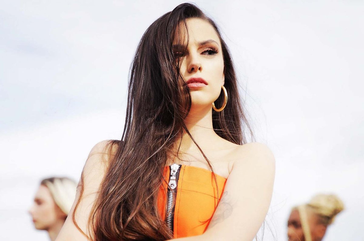 billboard's tweet image. .@CherLloyd returns with sultry new single "None Of My Business" blbrd.cm/olL0IY