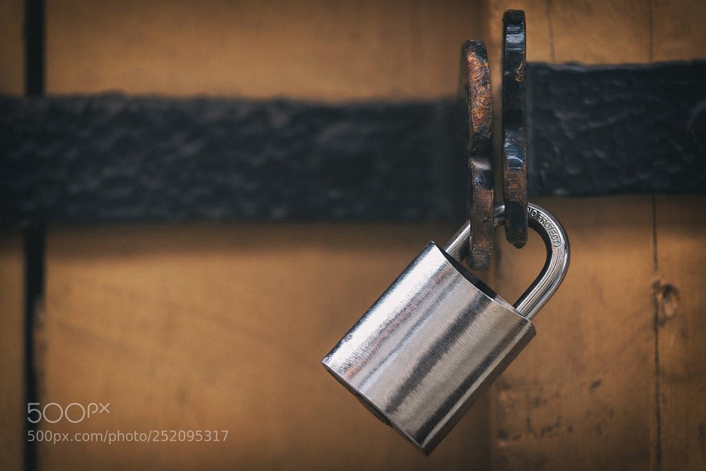 Padlock (автор фото stefanholm) #antique,background,barricaded,brown,closed,detail,door,entrance,exterior,front,gate,iron,ironwork,lock,metal,modern,old,padlock,private,protection,reflection,retro,safeguard,safety,secure,security,steel,vintage,wood,orange
