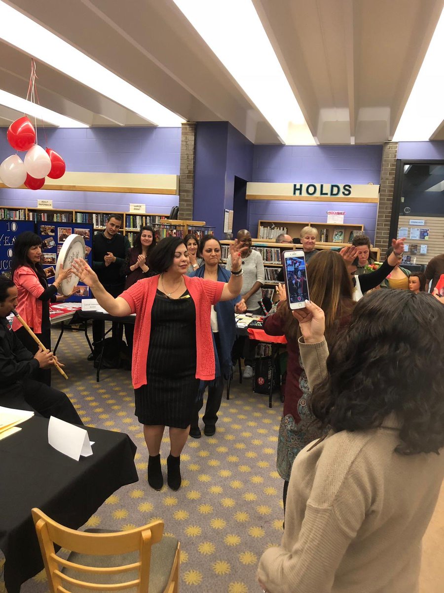 NextStopCanada's tweet photo. Today we are celebrating 10 Years of Success of Library Settlement Partnerships on #LSPDay with cake, dancing and meaningful partnerships at the Centennial Library! @torontolibrary #settlementservices https://t.co/1bDdbOxFao